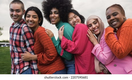 Happy young multi ethnic women having fun together in a public park - Diversity and friendship concept  - Shutterstock ID 2207590681