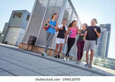 Happy young multiracial sport team going to workout - Shutterstock ID 1904118793