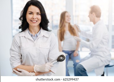 Happy Young Patient Having Conversation With Dermatologist The Hospital