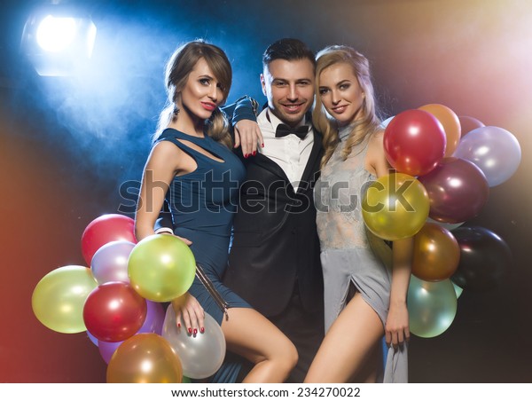 Happy Young People Celebrating New Years Stock Photo (Edit Now) 234270022