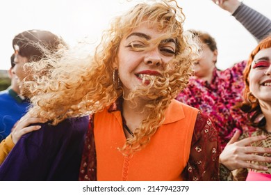 Happy Young People Dancing Outdoor At Festival Event - Party And Entertainment Concept - Focus On Center Girl Face