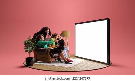 Happy young people, emotional friends watching football match, sport show. Youth sitting on sofa in front of huge 3D model of tv screen. Concept of sport, leisure activities, betting, ad