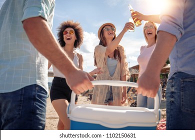Happy young people having party on the beach.Summer holidays,people,friendship,fun and  vacation concept. - Powered by Shutterstock