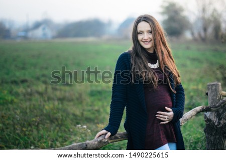 Similar – Unrecognizable pregnant woman showing ultrasound of her baby on the mobile