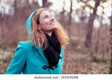 Happy Young Redhead Caucasian Woman Waiting For Spring In Nature, Outdoors