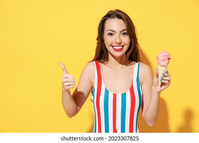 Busty girl selling ice-creams on the beach