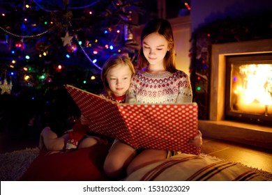 Happy Young Sisters Reading Story Book Stock Photo 1531023029 ...