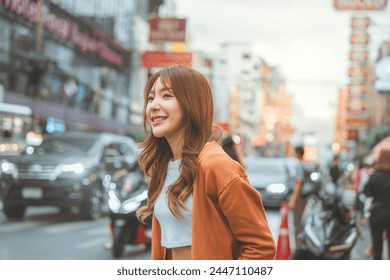 Happy young tourist asian woman walking in the street Chinatown Bangkok urban city, Female shopping and eating street food on summer holiday vacation - Powered by Shutterstock