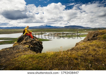 Similar – Mountains in Iceland are reflected in the water