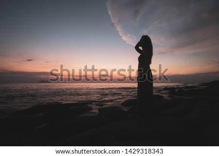 Similar – woman beach sunset horizon