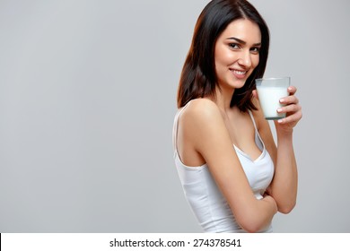 Happy Young Woman Drinking Milk