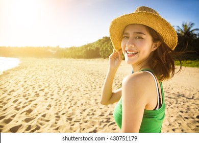 happy young woman enjoy summer vacation on the beach 