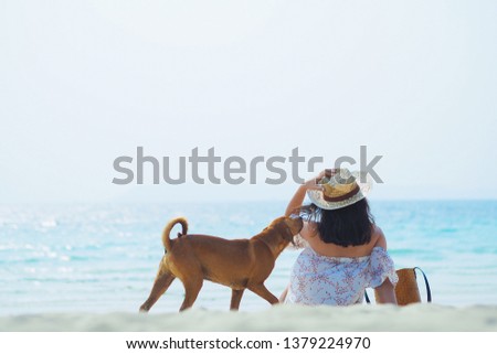Happy young woman enjoy summer vacation on the beach 