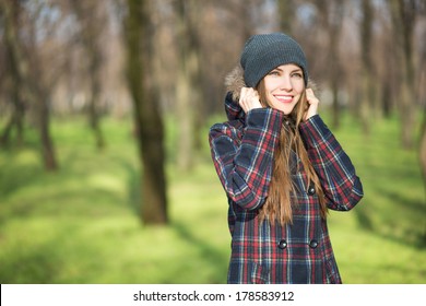 Happy Young Woman Enjoying Early Spring Sunshine