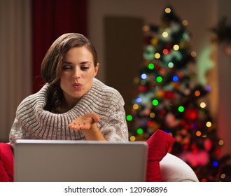 Happy Young Woman Having Christmas Video Chat With Lover