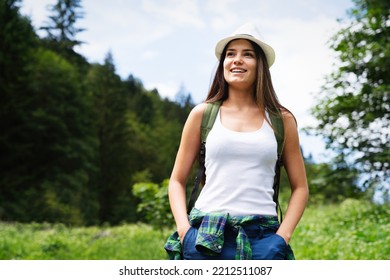 Happy Young Woman Hiker Hiking Portrait With Backpack. Fresh And Healthy Lifestyle.