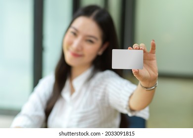 Happy Young Woman Hold Blank Business Card For Mockup, Credit Card Mockup For Montage Your Brands, Online Shopping, Cashless, Contactless Payment, Online Payment