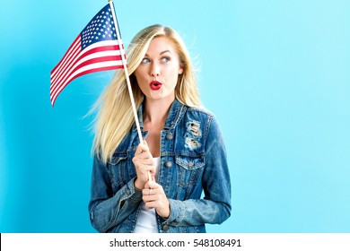 Happy Young Woman Holding American Flag