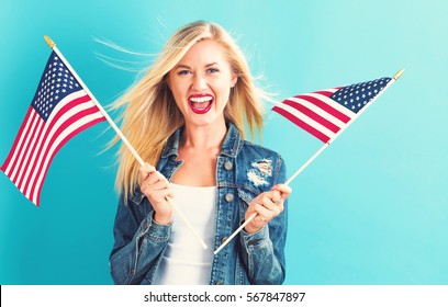 Happy Young Woman Holding American Flag