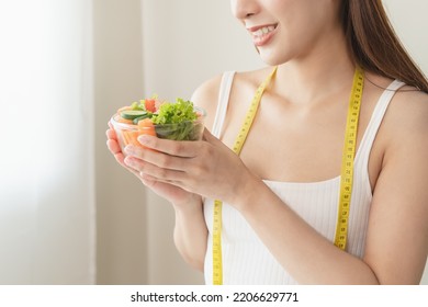 Happy Young Woman Holding Bowl Of Vegan Meal For Wellness Health.