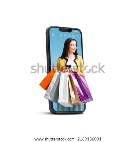 Happy young woman holding many shopping bags in a smartphone screen, online shopping offers, isolated on white background