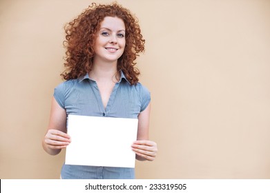 Happy Young Woman Holding A White Banner