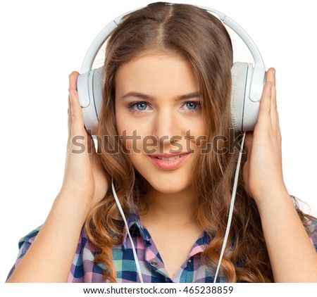 Similar – Blonde woman listening to music with her headphones