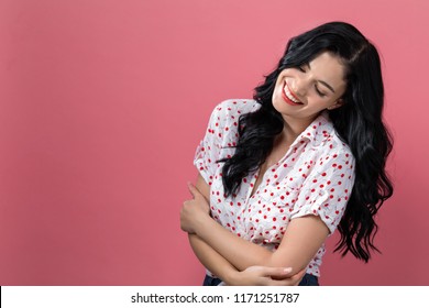 Happy Young Woman On A Solid Background