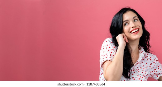 Happy Young Woman On A Solid Background