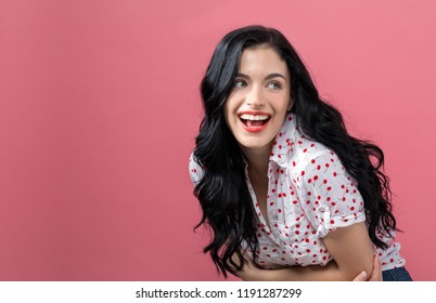 Happy Young Woman On A Solid Background