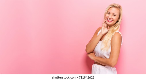 Happy Young Woman On A Solid Background