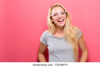 Happy Young Woman On A Solid Background