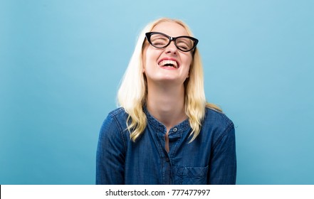 Happy Young Woman On A Solid Background