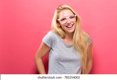 Happy Young Woman On A Solid Background