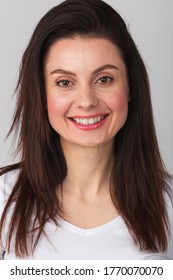 Happy Young Woman Photo,toothy Smile.Beautiful Girl In 30s Photo With White Teeth,red Lipstick In Studio Wearing Casual White T-shirt.Download Royalty Free Curated Images With Beautiful Natural People