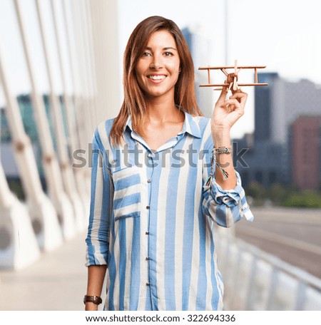 happy young woman with plane