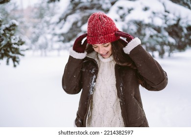 Happy Young Woman Plays With A Snow In Sunny Winter Day. Walk In Winter Forest. Christmas,  Holidays Concept.