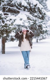 Happy Young Woman Plays With A Snow In Sunny Winter Day. Walk In Winter Forest. Christmas,  Holidays Concept.