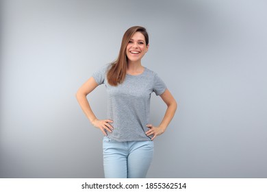 Happy Young Woman Portait On Gray Background. 