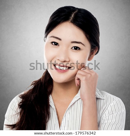 Happy young woman posing to camera
