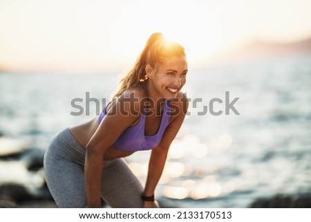 Similar – Image, Stock Photo Young woman resting after working out outdoors at sunset