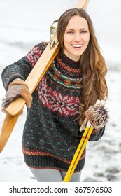 Happy Young Woman With Retro Ski Outdoors Portrait