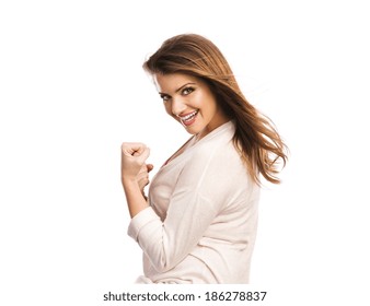 Happy Young Woman Saying Yes And Gesturing While Isolated On White Background