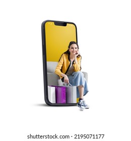 Happy young woman with shopping bags in a smartphone, online shopping and sales concept, isolated on white background - Powered by Shutterstock