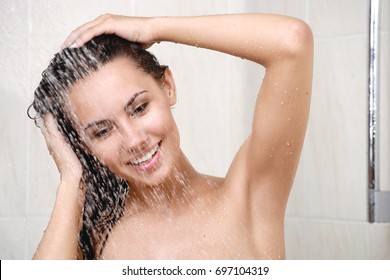 Happy Young Woman In Shower