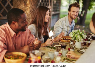 Happy Young Woman Sitting By Thanksgiving Stock Photo 312679610 ...