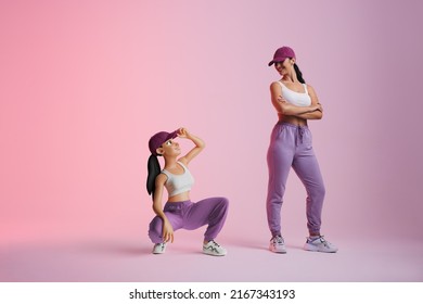 Happy young woman smiling at her metaverse avatar in a studio. Cheerful young woman standing next to the 3D simulation of herself. Sporty young woman exploring virtual reality. - Shutterstock ID 2167343193