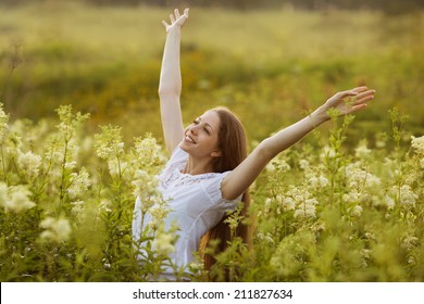 Happy Young Woman In A State Of Rapture