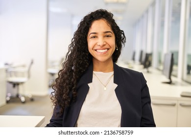 Happy Young Woman As A Successful Business Start-up Founder In The Office