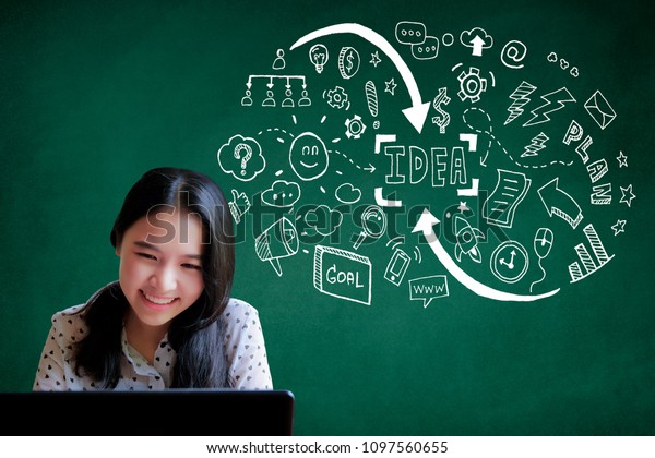Happy young woman thinking dreaming has many ideas\
looking up isolated grey wall background. Positive human face\
expression emotion feeling life perception. Decision making process\
concept. 